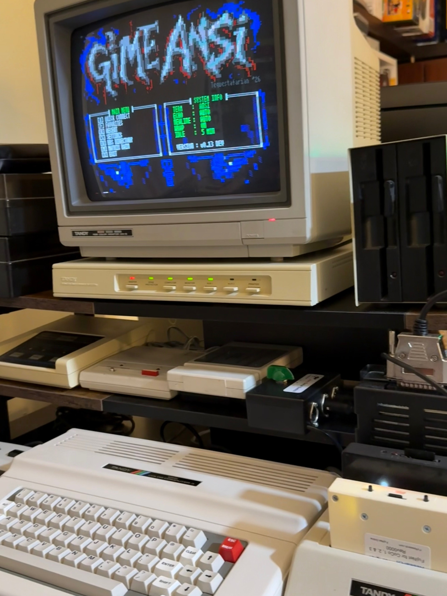 GiME ANSi v0.13 running on a real Tandy Color Computer 3 and CM-8 monitor