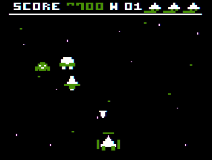 Space Raid gameplay on the Tandy Color Computer 3 showing the player ship, enemies, score, and lives